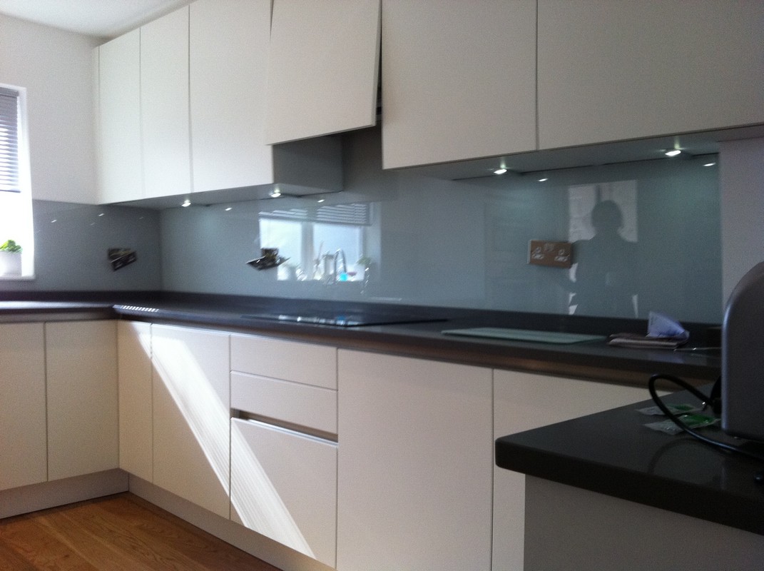 Grey glass kitchen splashback with LED lighting in Bloomsbury